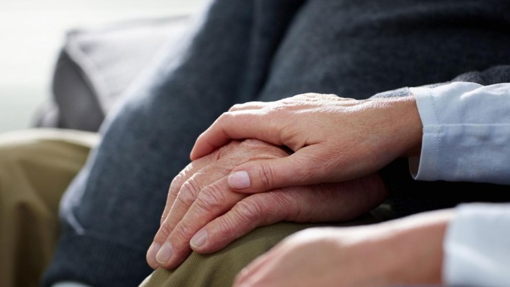 Hände, die sich halten